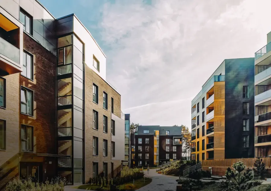 Apartment blocks with balconies and solar panels on the roof
